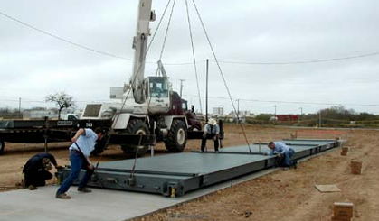A steel deck weighbridge is installed